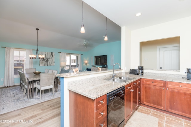 kitchen with kitchen peninsula, light stone countertops, light wood-type flooring, dishwasher, and sink