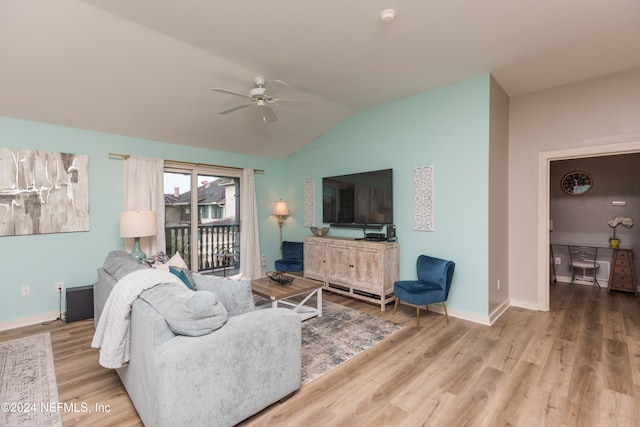 living room with hardwood / wood-style floors, vaulted ceiling, and ceiling fan