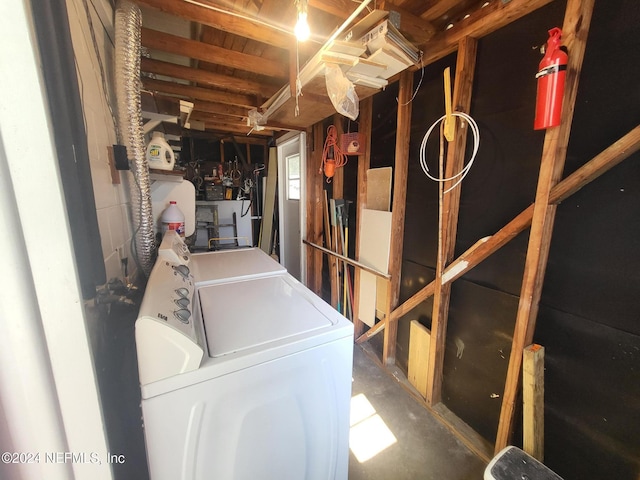 basement with washing machine and clothes dryer