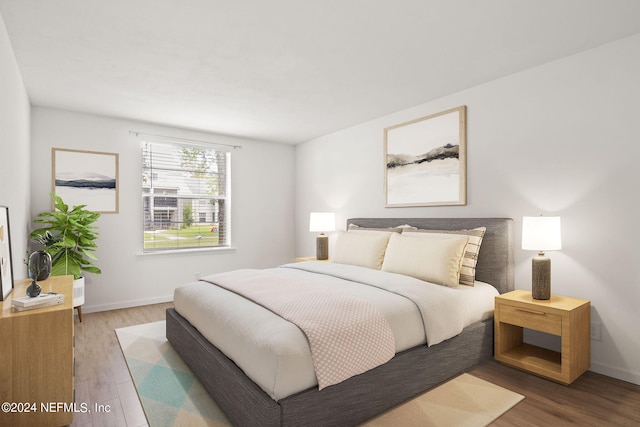 bedroom featuring hardwood / wood-style floors