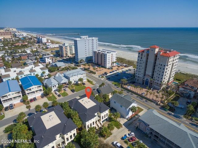 drone / aerial view with a view of the beach and a water view