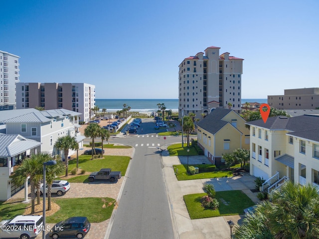 drone / aerial view with a water view