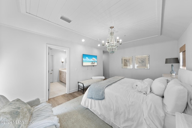 bedroom with light wood-type flooring, ensuite bathroom, wooden ceiling, and a chandelier