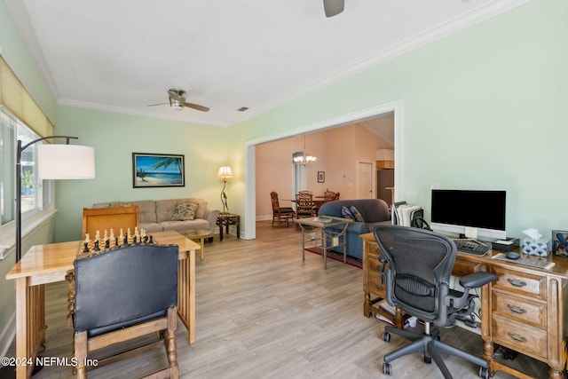 office space with crown molding, ceiling fan with notable chandelier, and light wood-type flooring