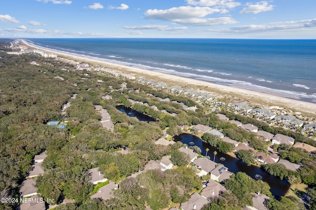 bird's eye view with a view of the beach and a water view