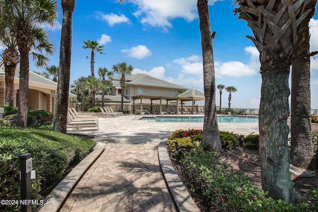 view of swimming pool featuring a patio