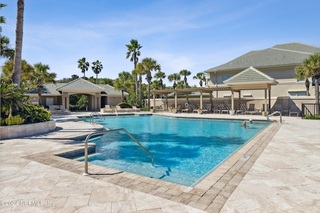 view of pool featuring a patio