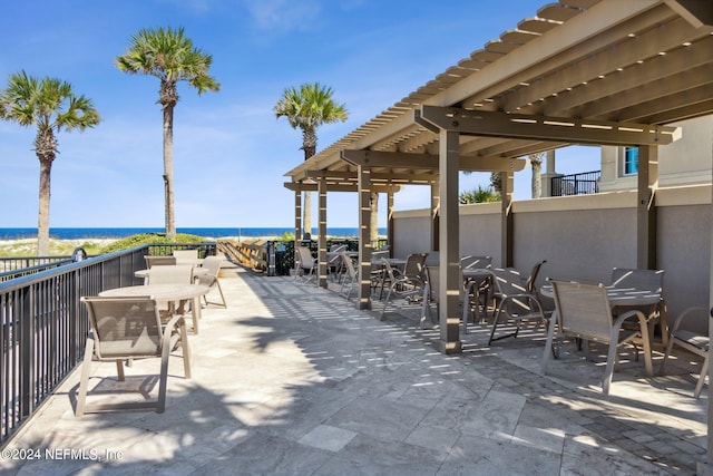 view of patio / terrace featuring a water view