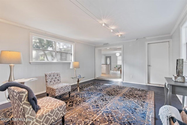 sitting room featuring ornamental molding