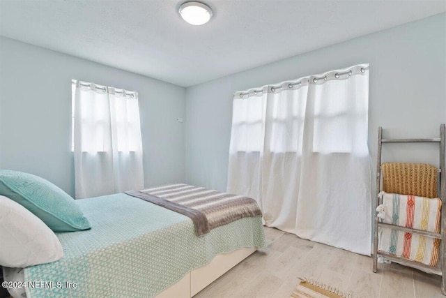 bedroom featuring light wood-type flooring