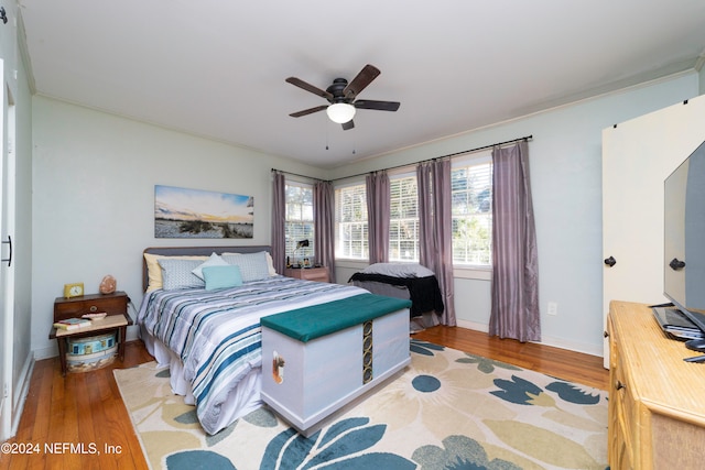 bedroom featuring ceiling fan and wood-type flooring