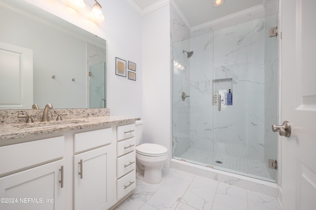 bathroom featuring ornamental molding, a shower with door, vanity, and toilet