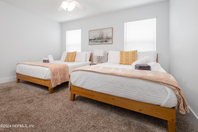 bedroom with carpet and ceiling fan