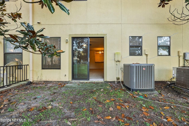 doorway to property featuring cooling unit