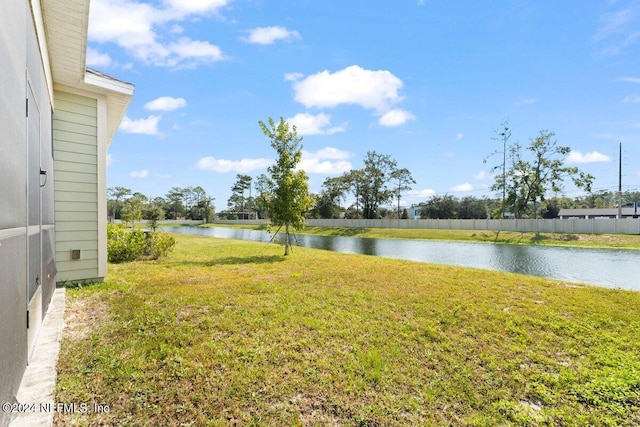 view of yard with a water view