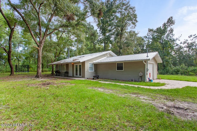 exterior space featuring a lawn