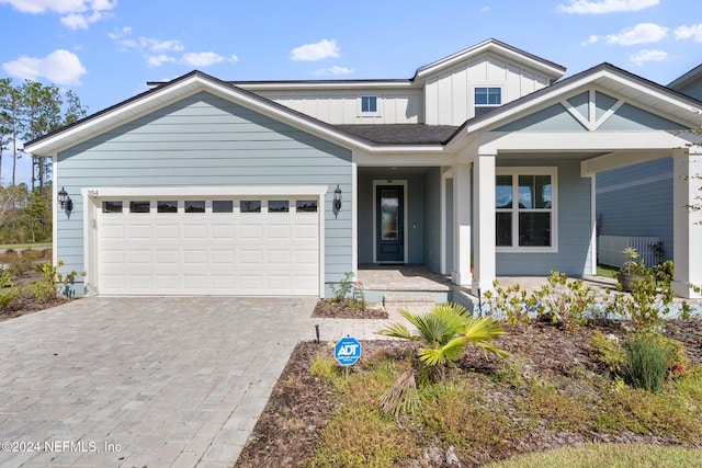 view of front of property with a garage