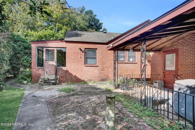 view of home's exterior featuring a patio