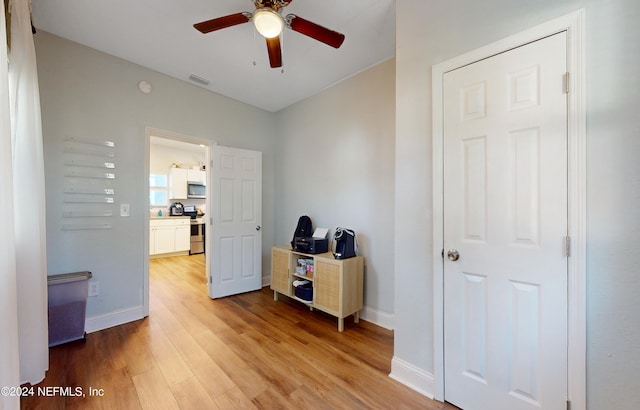 interior space featuring ceiling fan and light hardwood / wood-style flooring