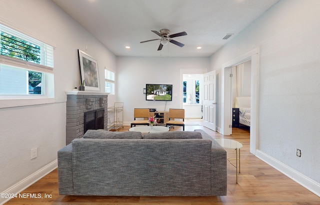 2069 W 14th St, Jacksonville, FL 32209 - living room featuring ceiling fan, a brick fireplace, wood finished floors, baseboards, and recessed lighting