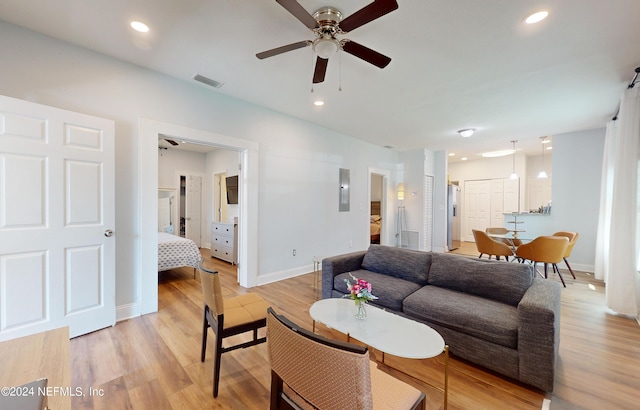 2069 W 14th St, Jacksonville, FL 32209 - living room with ceiling fan, light wood-type flooring, baseboards, and recessed lighting