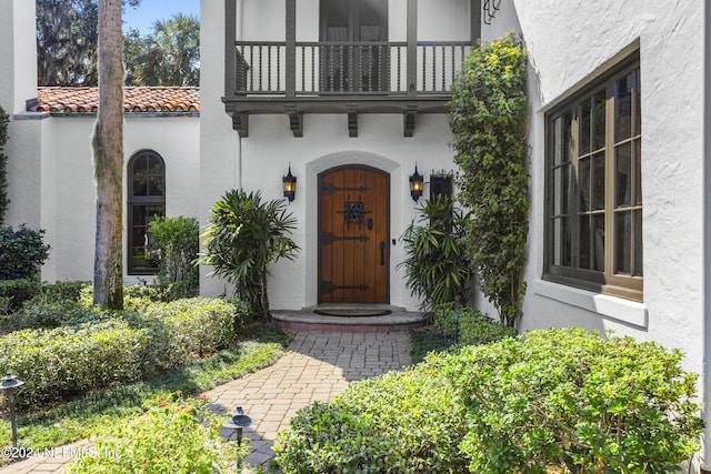 property entrance with a balcony