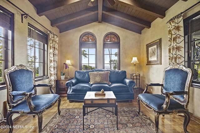 interior space with hardwood / wood-style floors, vaulted ceiling with beams, a healthy amount of sunlight, and wooden ceiling