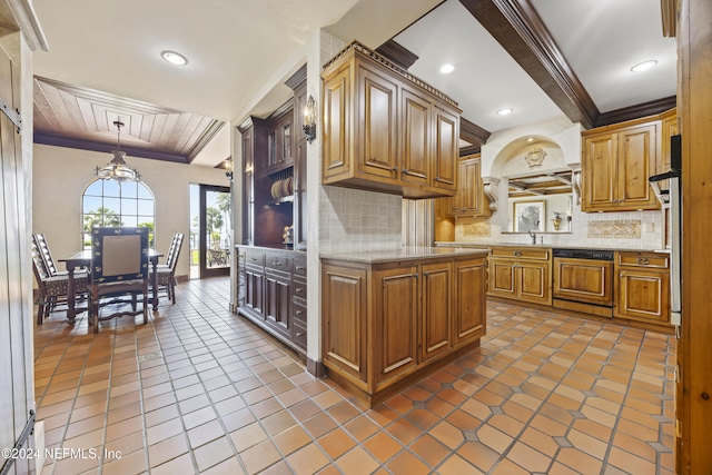 kitchen featuring ornamental molding, dark tile patterned floors, decorative light fixtures, decorative backsplash, and an inviting chandelier