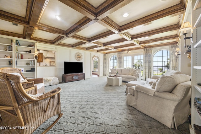 living room with ornamental molding, beam ceiling, coffered ceiling, and carpet