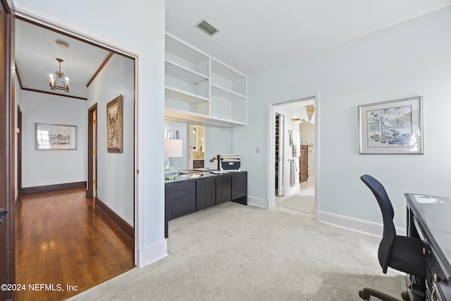 office area featuring crown molding, carpet flooring, and a chandelier