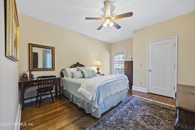 bedroom with dark wood-type flooring and ceiling fan