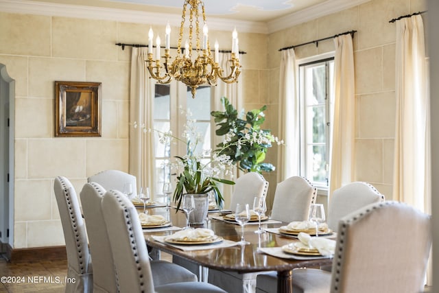 dining area with wood-type flooring, tile walls, and ornamental molding