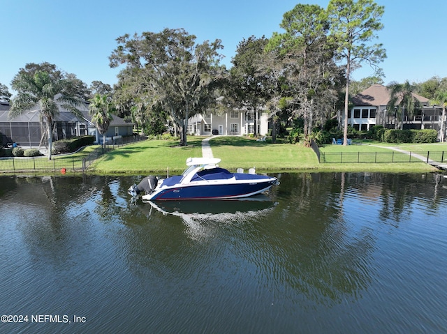 13601 Emerald Cove Ct, Jacksonville, FL 32225 - view of dock with a residential view, a lawn, a water view, and fence