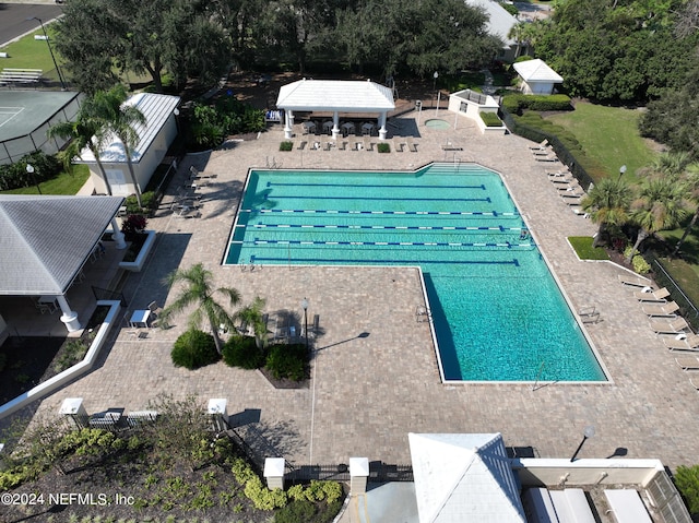 13601 Emerald Cove Ct, Jacksonville, FL 32225 - community pool featuring a patio area