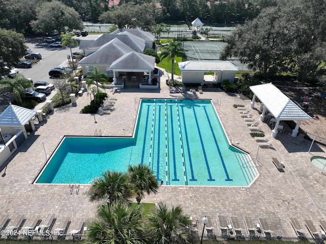 13601 Emerald Cove Ct, Jacksonville, FL 32225 - community pool featuring a gazebo, a patio area, and fence