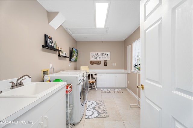 13601 Emerald Cove Ct, Jacksonville, FL 32225 - washroom featuring attic access, a sink, washer and clothes dryer, light tile patterned flooring, and laundry area