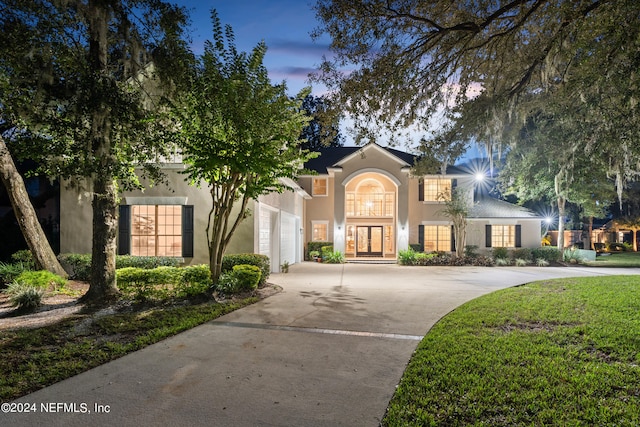 13601 Emerald Cove Ct, Jacksonville, FL 32225 - view of front facade featuring a garage, concrete driveway, and stucco siding