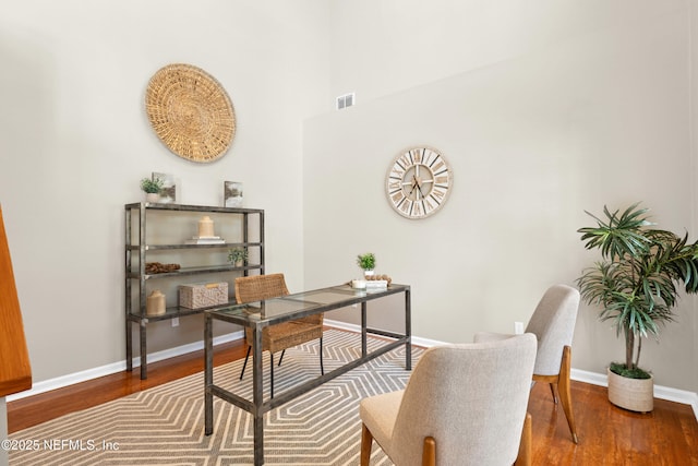 13601 Emerald Cove Ct, Jacksonville, FL 32225 - office featuring a high ceiling, baseboards, wood finished floors, and visible vents