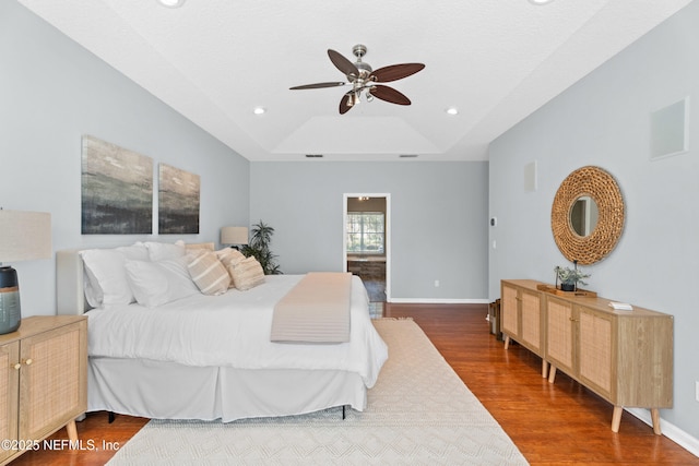 13601 Emerald Cove Ct, Jacksonville, FL 32225 - bedroom featuring dark wood-type flooring, a raised ceiling, baseboards, and recessed lighting