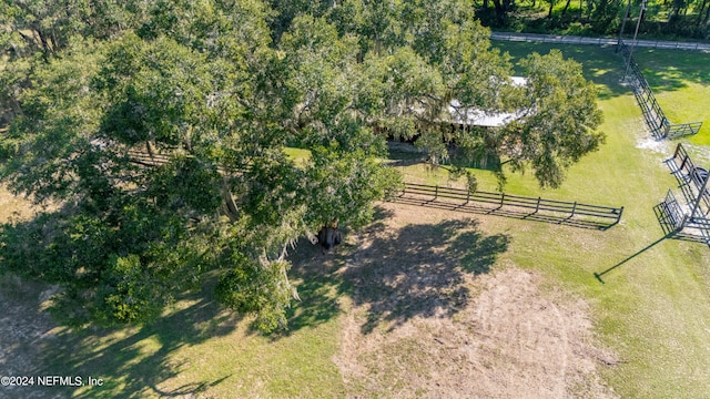 birds eye view of property featuring a rural view