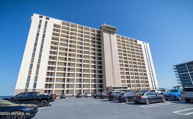 1301 1st St S Unit 1202, Jacksonville Beach, FL 32250 - view of apartment building / complex with uncovered parking