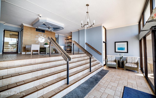 1301 1st St S Unit 1202, Jacksonville Beach, FL 32250 - staircase with a chandelier and ornamental molding