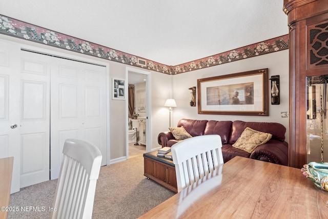 1301 1st St S Unit 1202, Jacksonville Beach, FL 32250 - living room with light colored carpet and baseboards