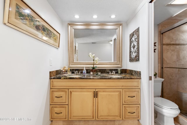 1301 1st St S Unit 1202, Jacksonville Beach, FL 32250 - full bath featuring double vanity, toilet, a tile shower, and recessed lighting