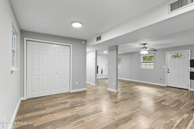 foyer featuring hardwood / wood-style flooring and ceiling fan