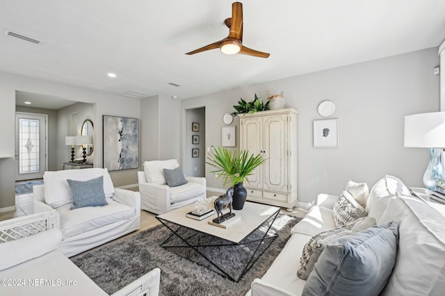 living room featuring ceiling fan