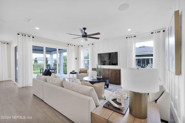 living room featuring ceiling fan