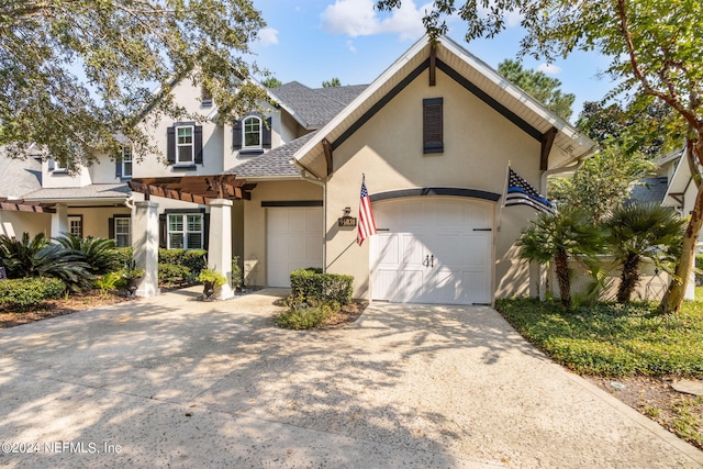 view of front of property with a garage