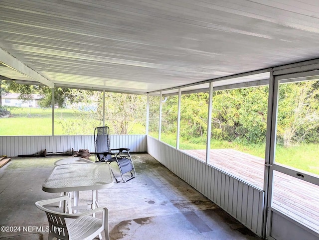 sunroom / solarium featuring plenty of natural light