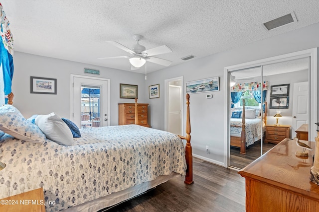 bedroom with multiple windows, access to exterior, dark wood-type flooring, and ceiling fan